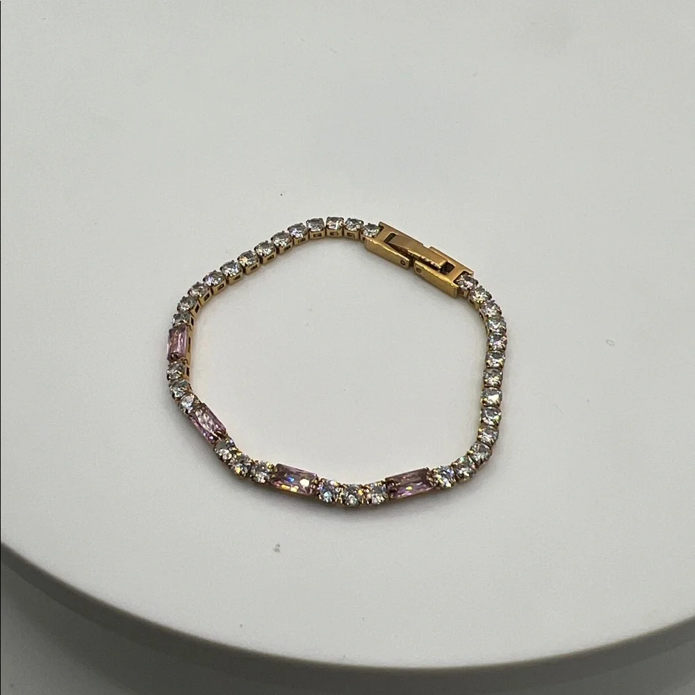 454. Elegant Gold and Pink Bracelet